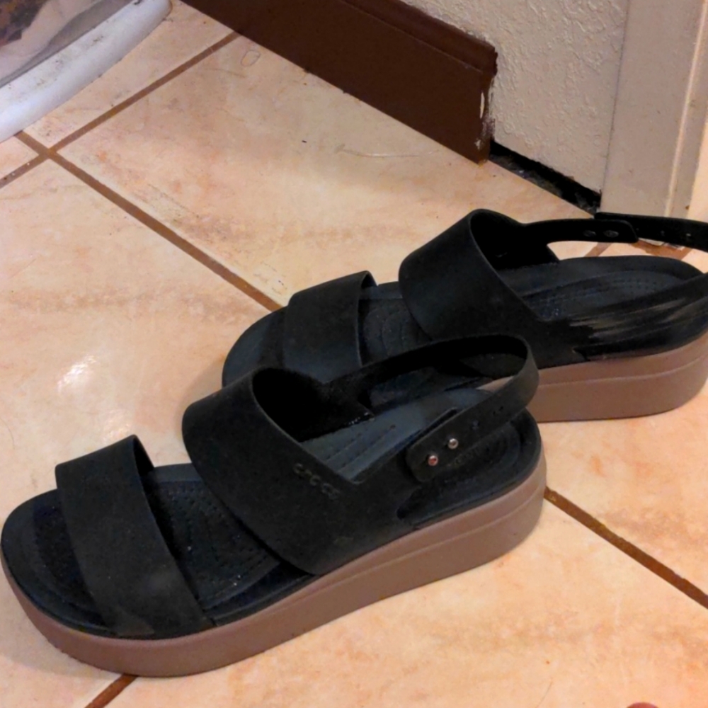 Black and tan Crocs wedge